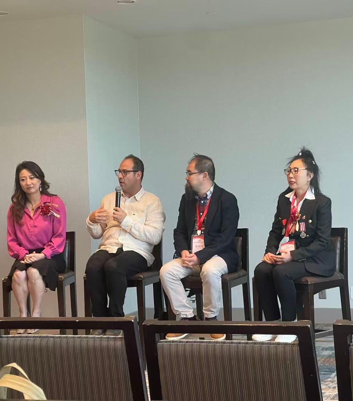 Professionals taking part in a panel discussion