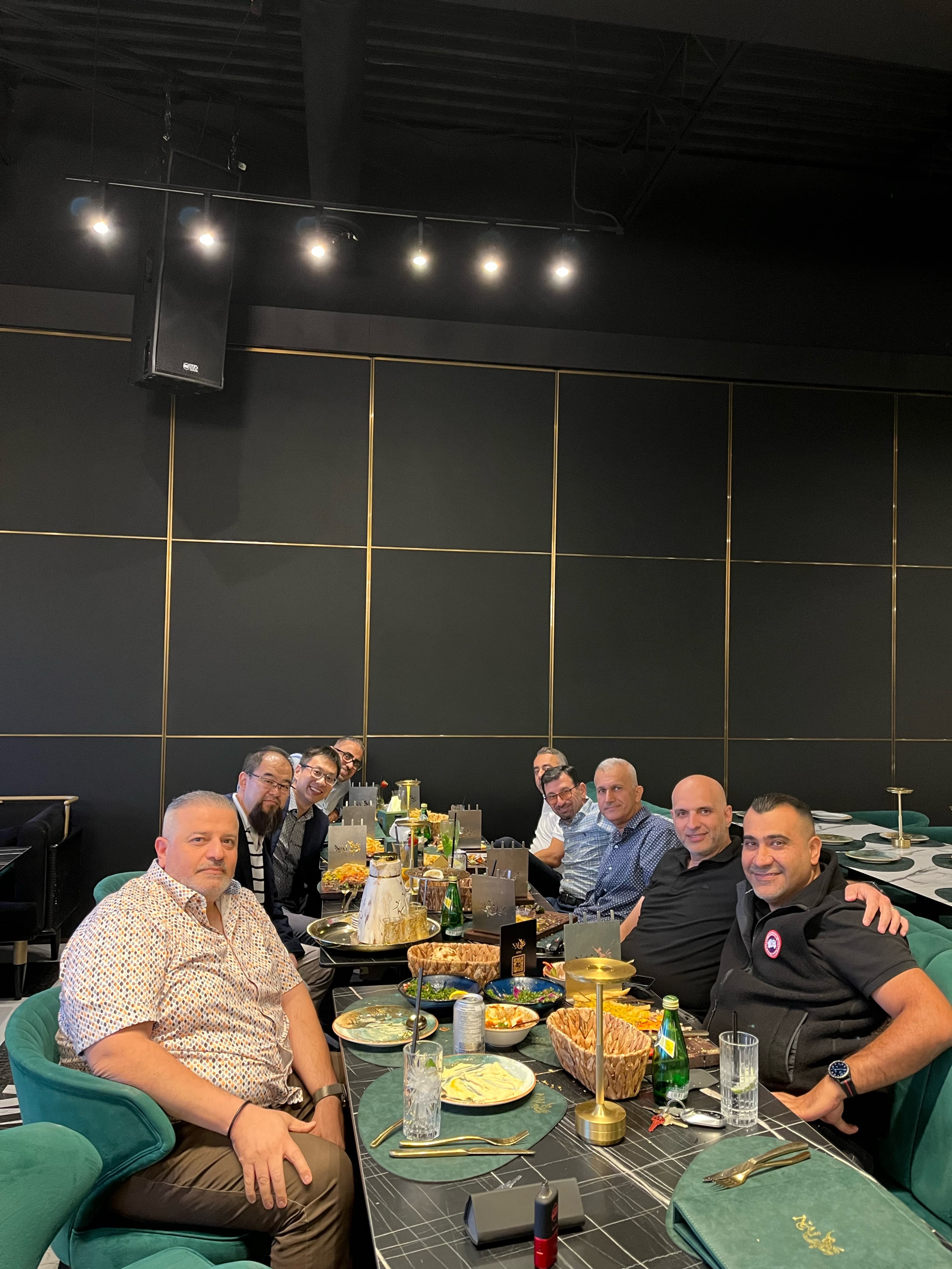 Professionals connecting during an informal group dinner