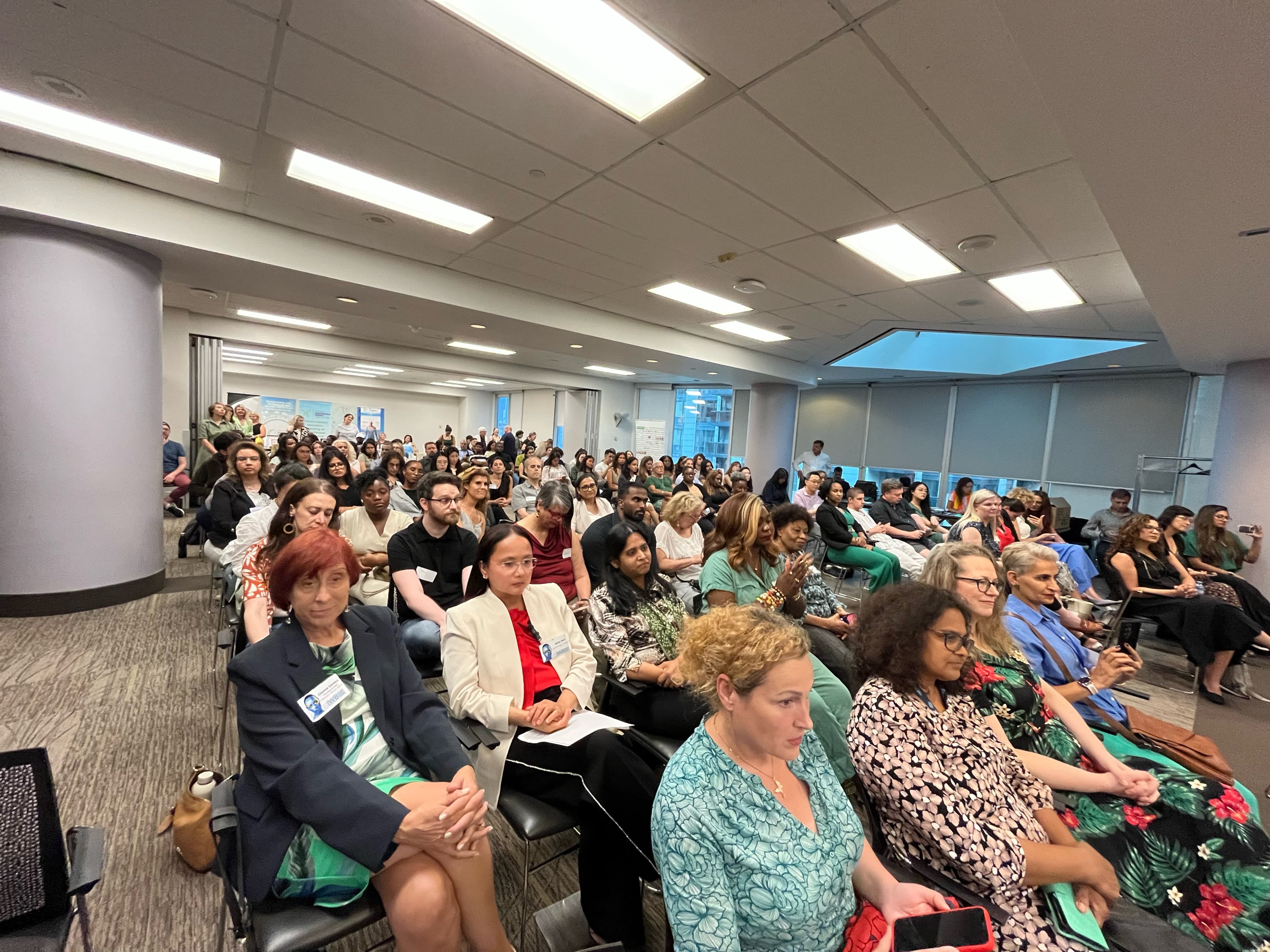 Audience attending a professional presentation and discussion